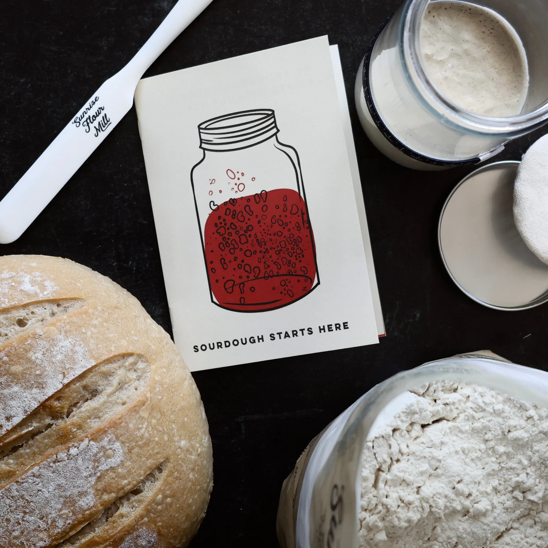 Guide and tools included in the sourdough bread starter kit